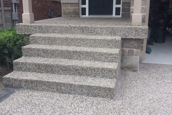 The Luxurious Appeal of Exposed Aggregate Driveways Paving the Path to Opulence 